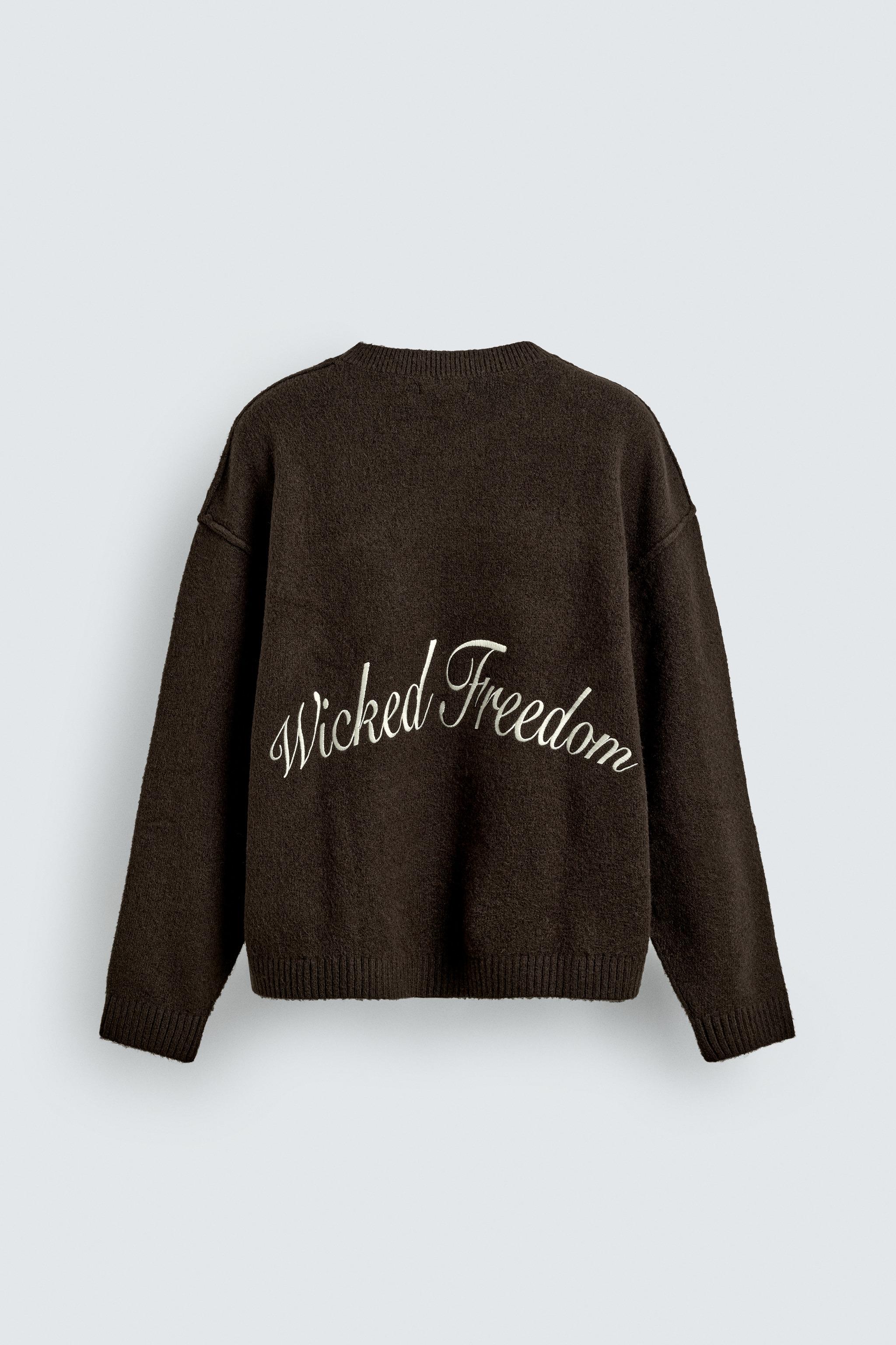 PULL EN JACQUARD AVEC INSCRIPTION